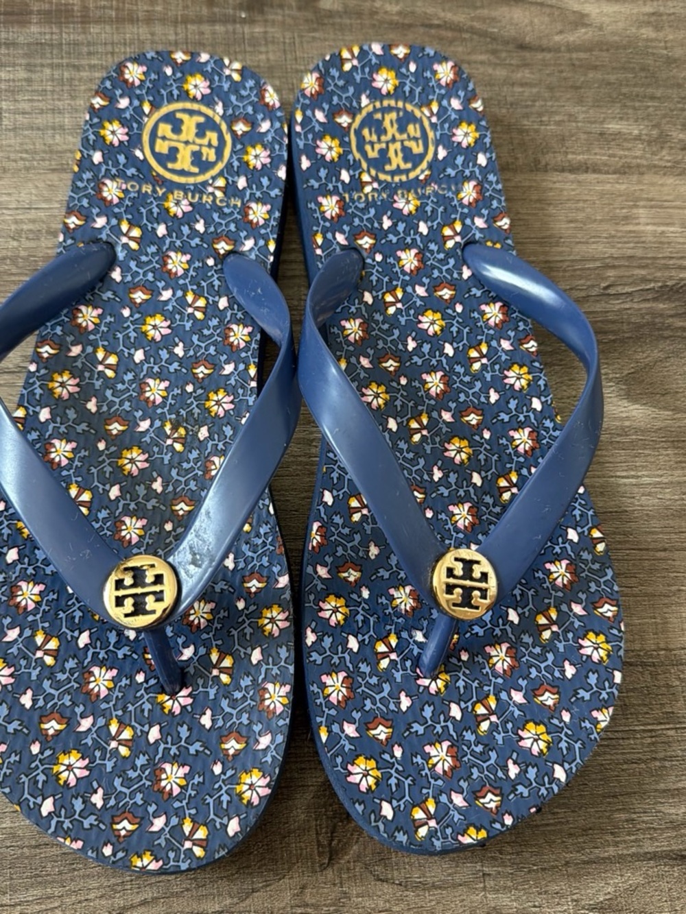 Tory Burch Navy Floral Logo Flip Sandals with Gold Emblem